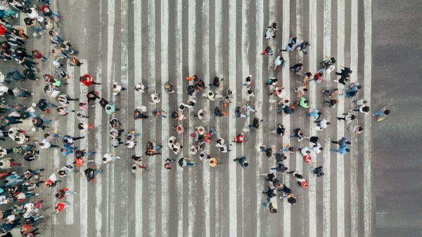 High Angle View Of People forming and arrow on the street High Angle View Of People forming and arrow on the street