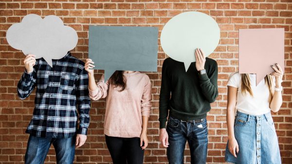 Friends holding up copyspace placard thought bubbles Friends holding up copyspace placard thought bubbles